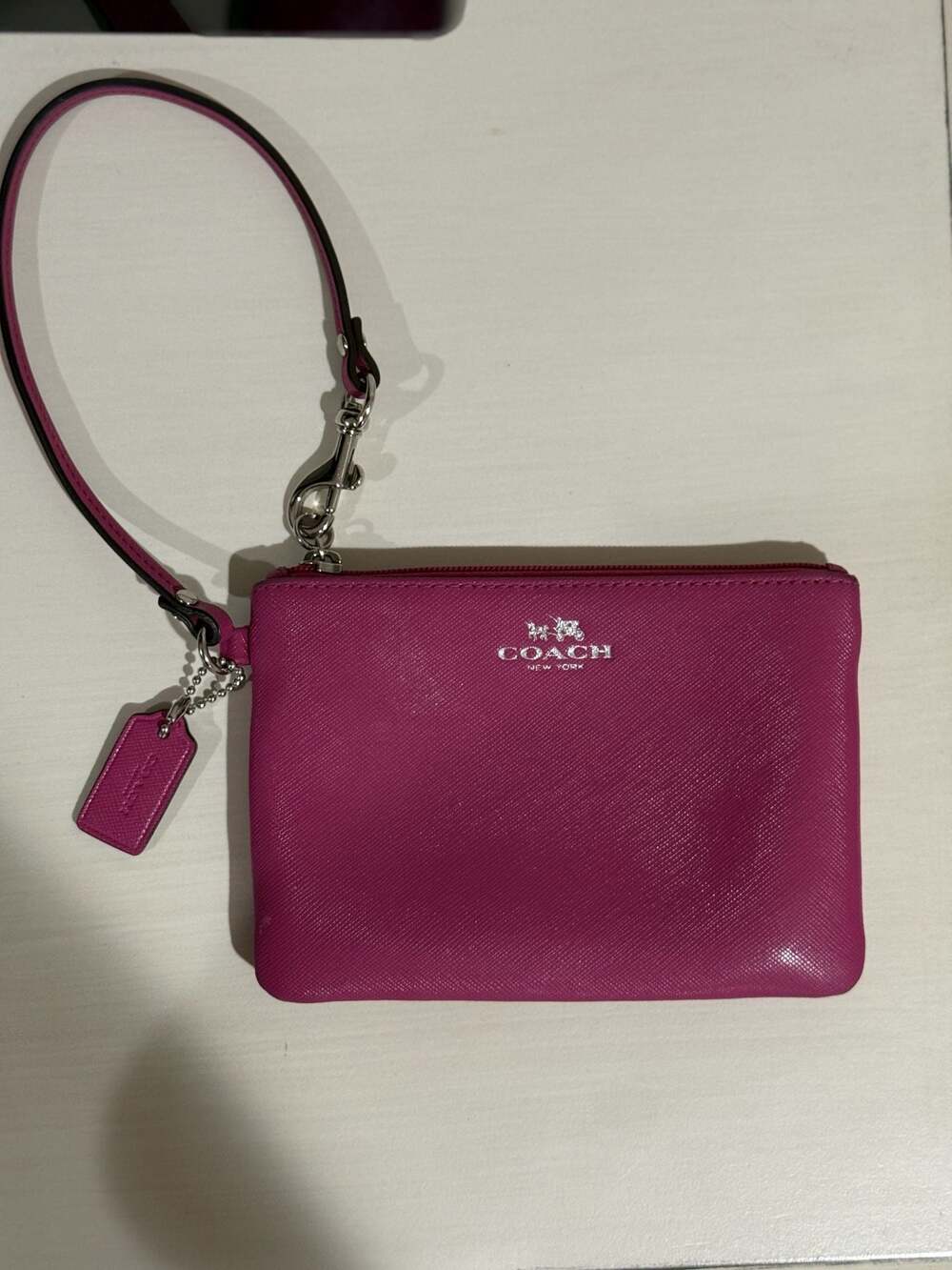 Coach Corner Zip Wristlet in Dark Fuchsia Crossgrain Leather